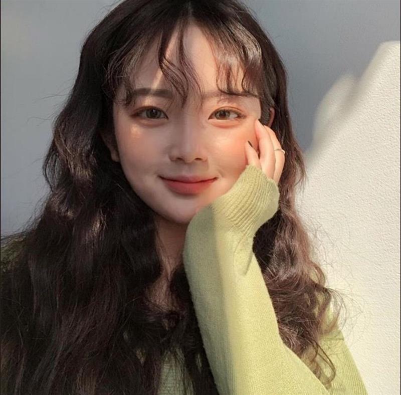 Kiểu tóc uốn mái - phù hợp với gương mặt không cân đối